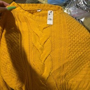 Small yellow sweater from garage